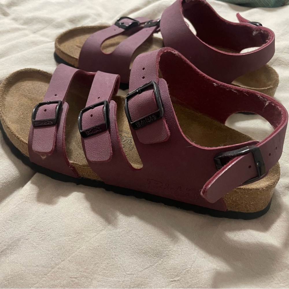Birkenstocks, purple.
